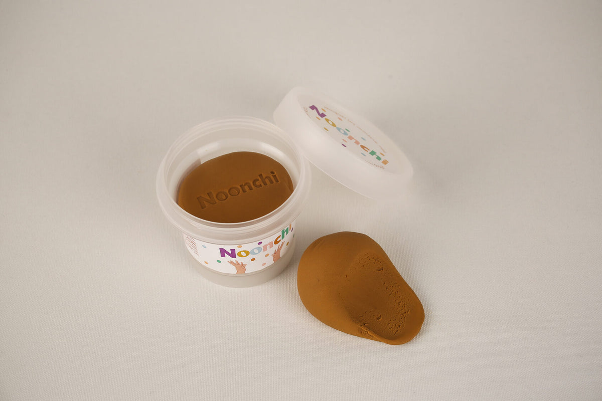 Eco-friendly ochre brown play dough – non-toxic modeling clay ideal for sculpting figures with dark skin tones, promoting inclusive creative play