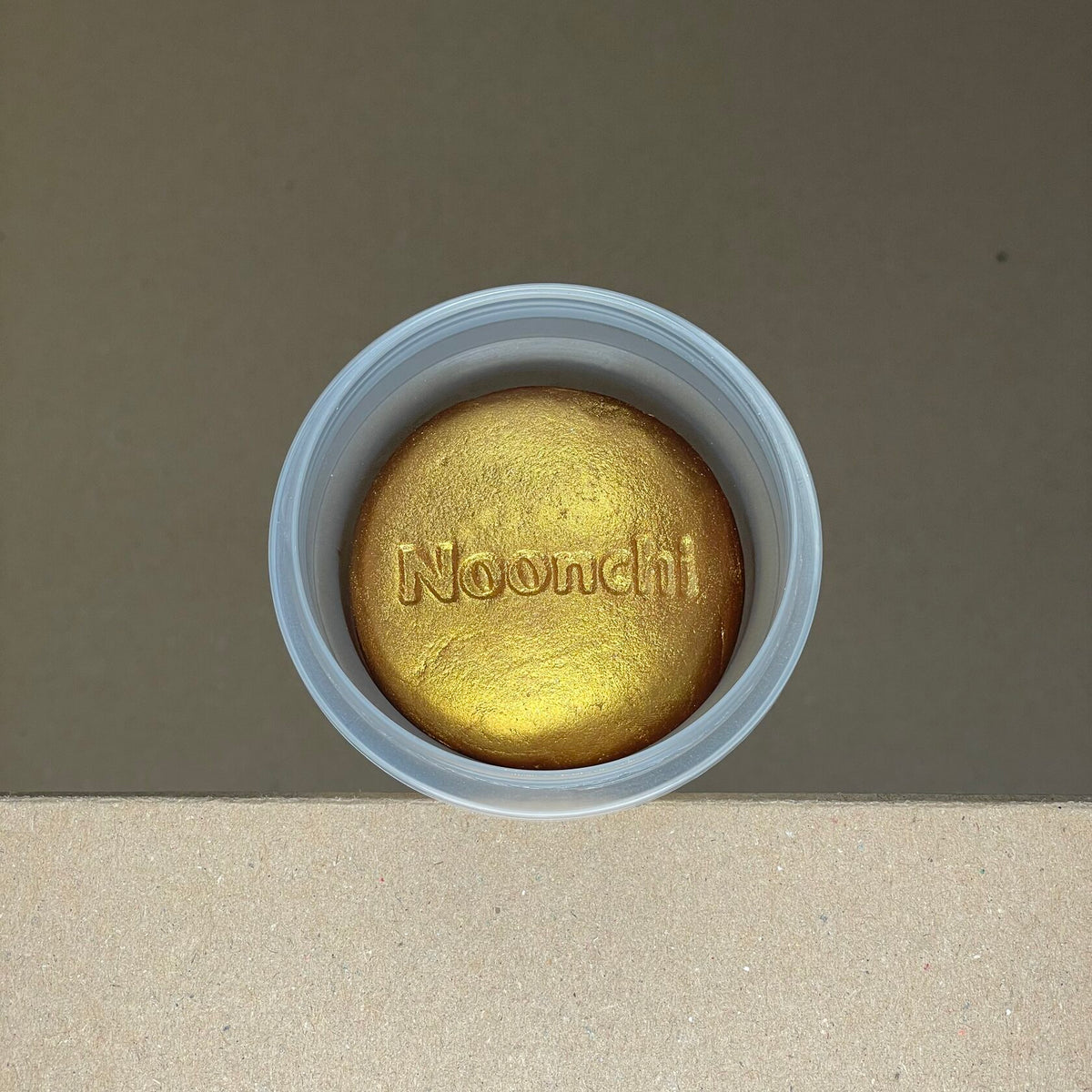 Noonchi Organic biodegradable play dough cup in banana yellow with golden glitter – safe, non-toxic, compostable, and loved by kids.