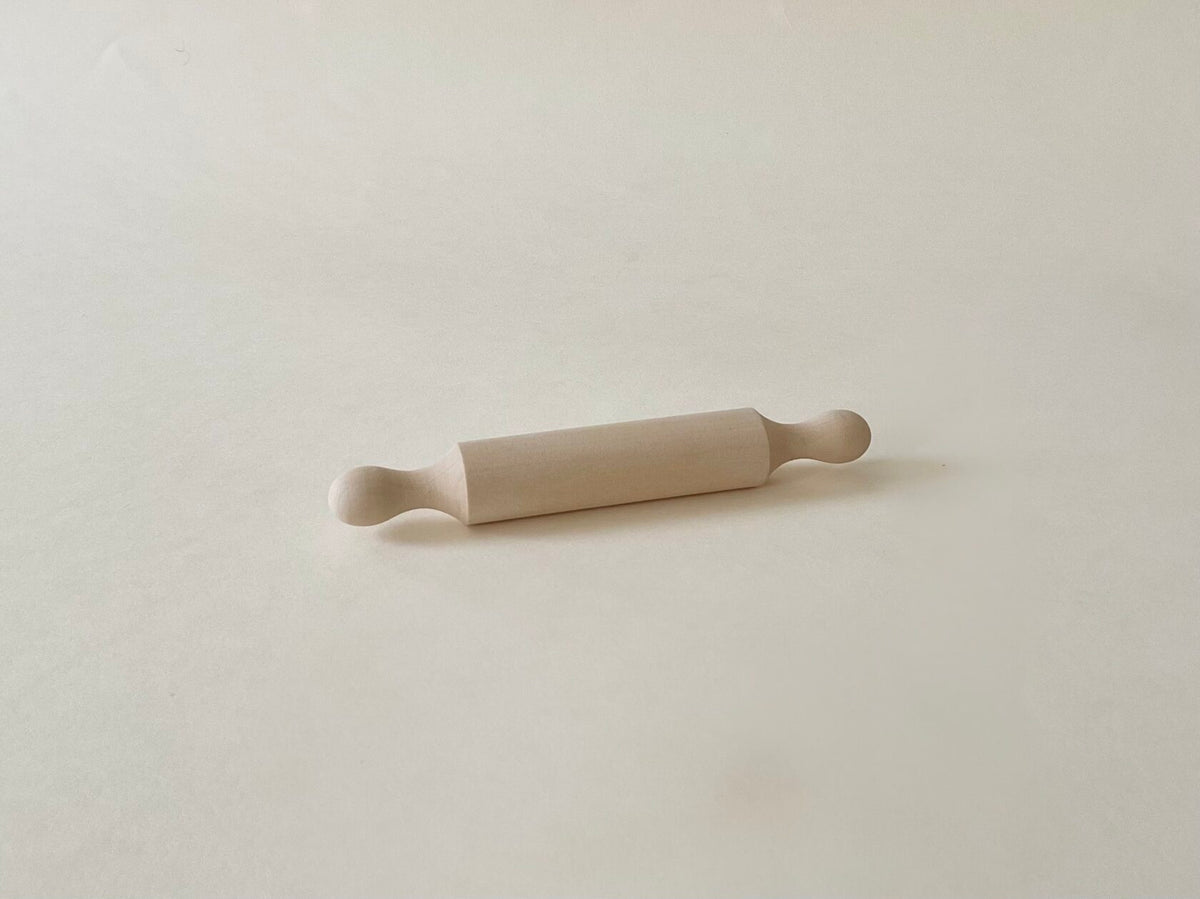 Child-sized wooden rolling pin – perfect for play dough activities and developing fine motor skills.